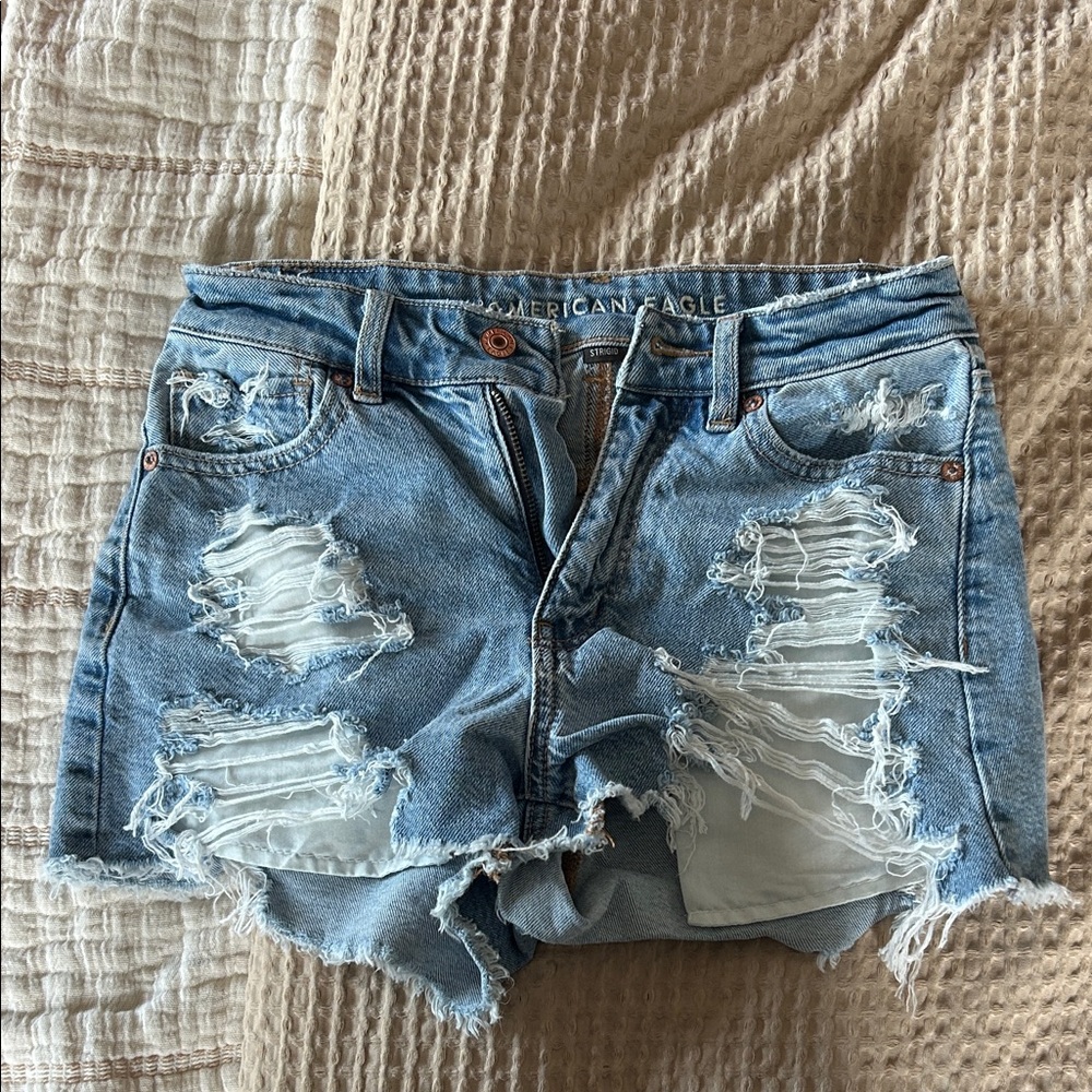 American Eagle Outfitters Ripped Light Blue Jean Shorts